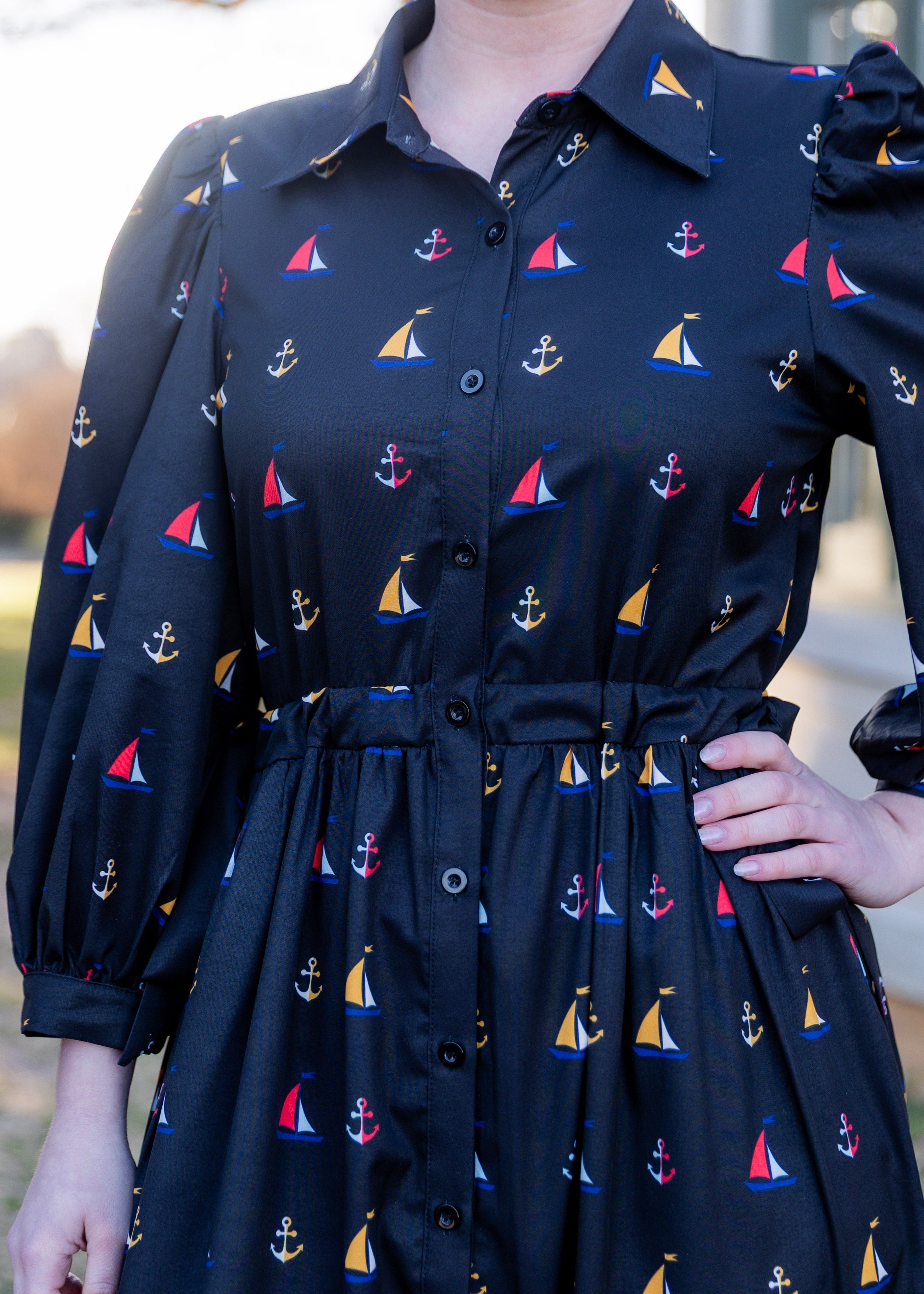 Model wearing the Nuggles® Leila Dress in Tiny Skipper