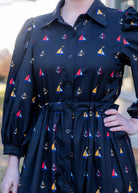 Model wearing the Nuggles® Leila Dress in Tiny Skipper