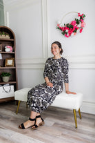 Model wearing Nuggles®  Cindy Bubble Dress in Mocha Brushstroke 