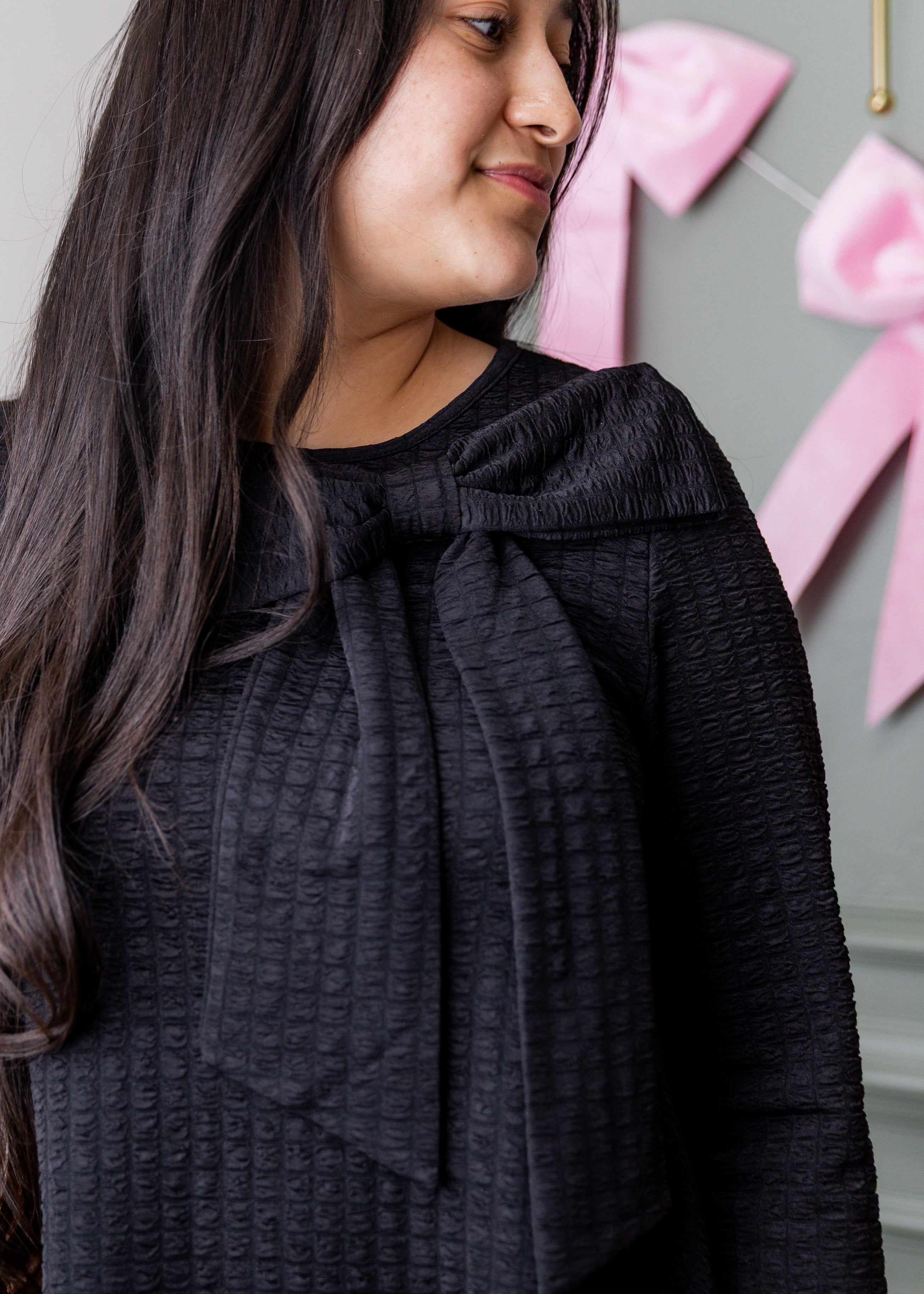 Model wearing Nuggles® Eleanor Top in Black