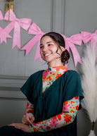 Model wearing Nuggles® Mesh Tee top in Confetti Bloom