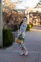 Model wearing the Nuggles® Original Midi Layering Dress in Wildflower Haze