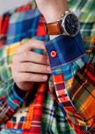 Model wearing Nuggles® Men's Button Down Shirt in Patch Plaid