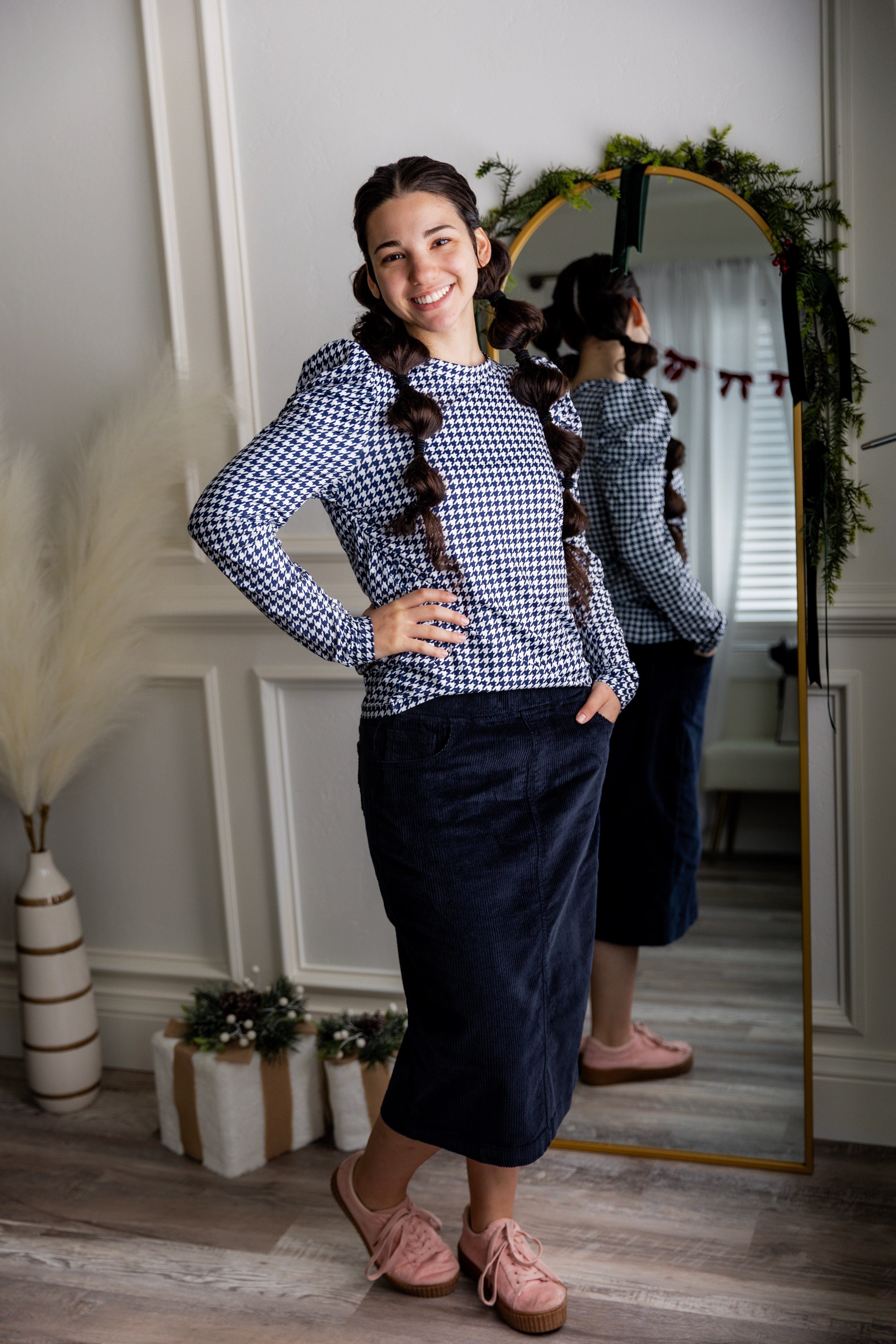 Model wearing Nuggles® 27-inch corduroy skirt
