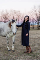 Model wearing the Nuggles® Farah Dress in Navy