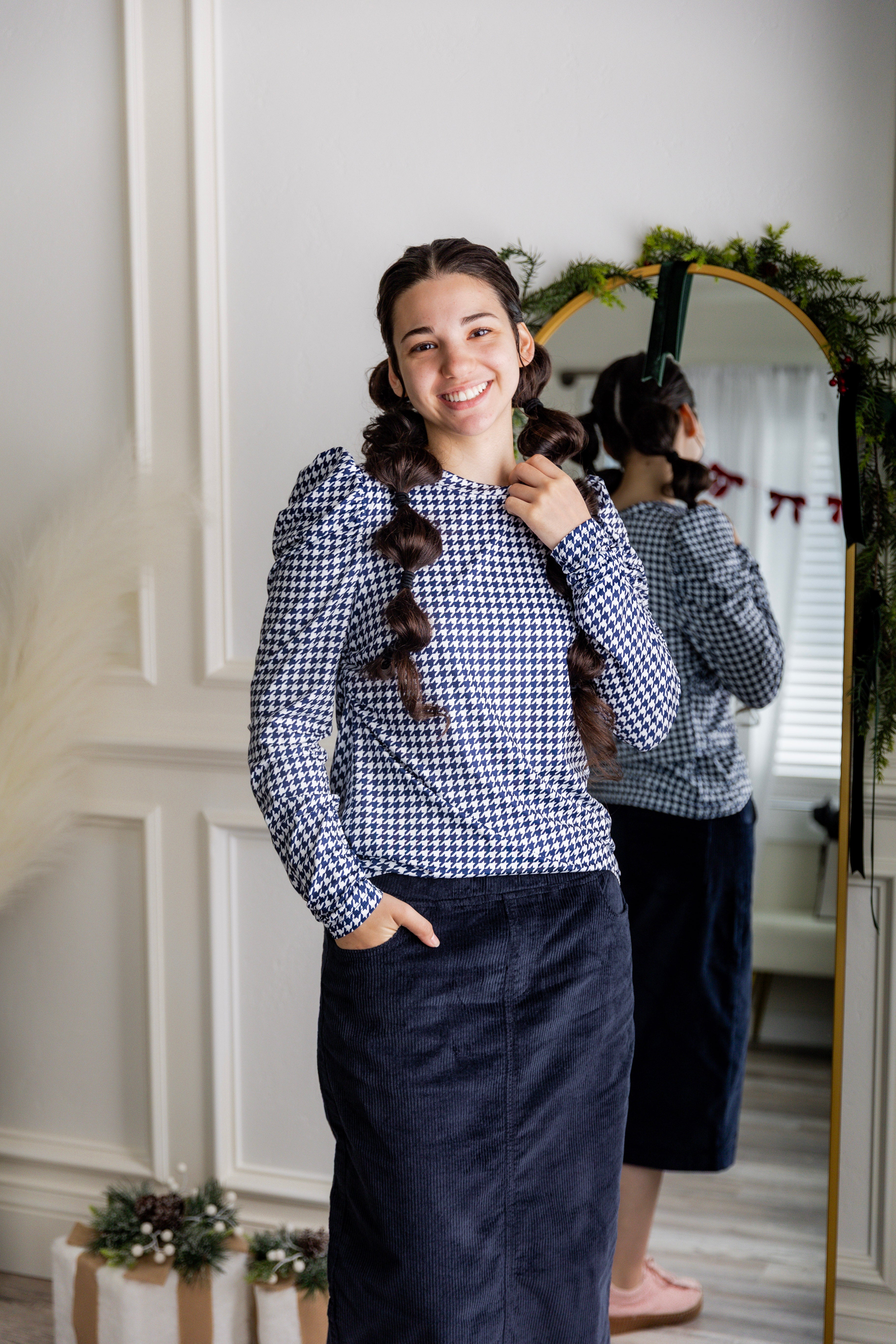Model wearing Nuggles® 27-inch corduroy skirt