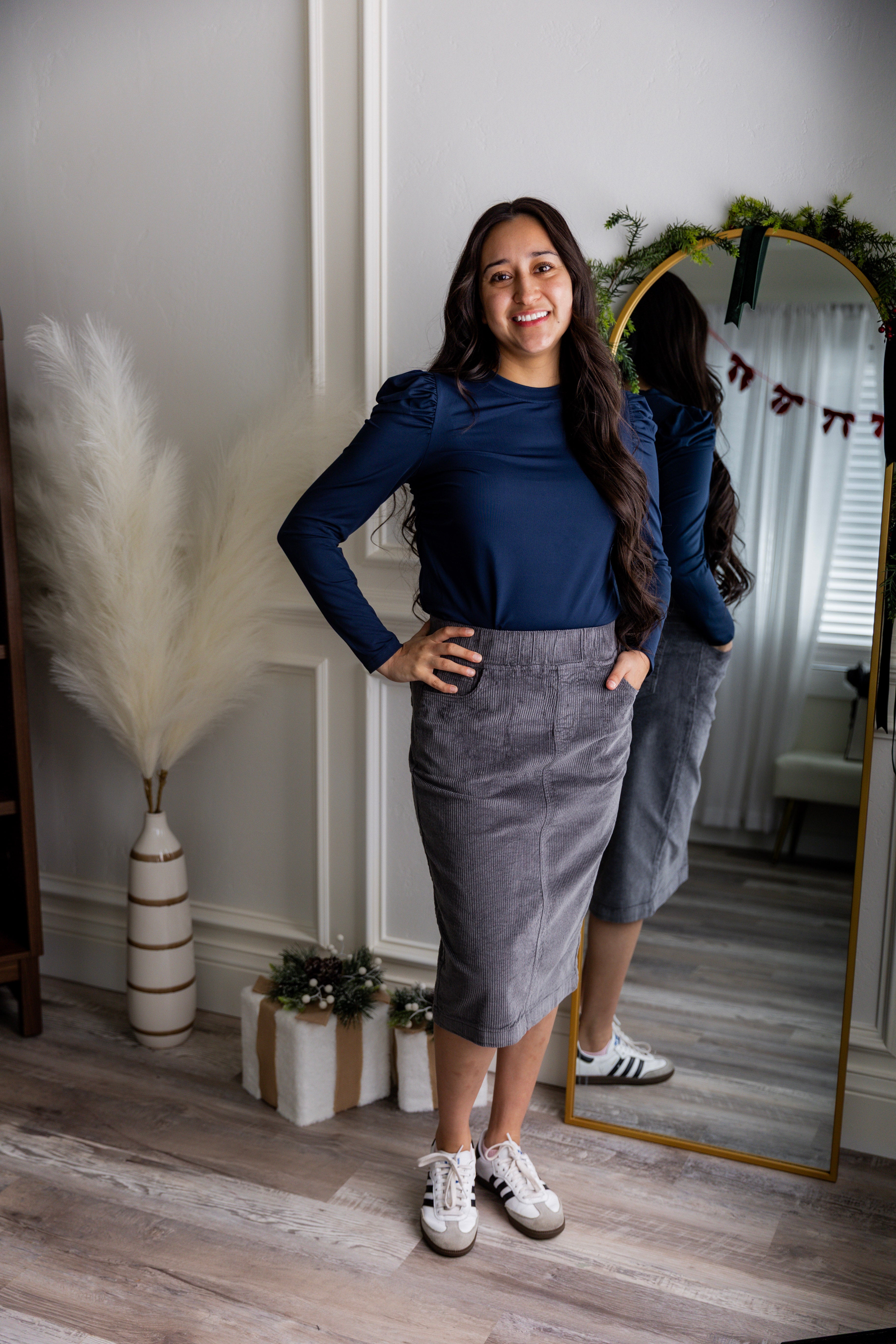 Model wearing Nuggles® 27-inch corduroy skirt