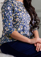 Model wearing the Nuggles® Lucia Top in Cottage Blue