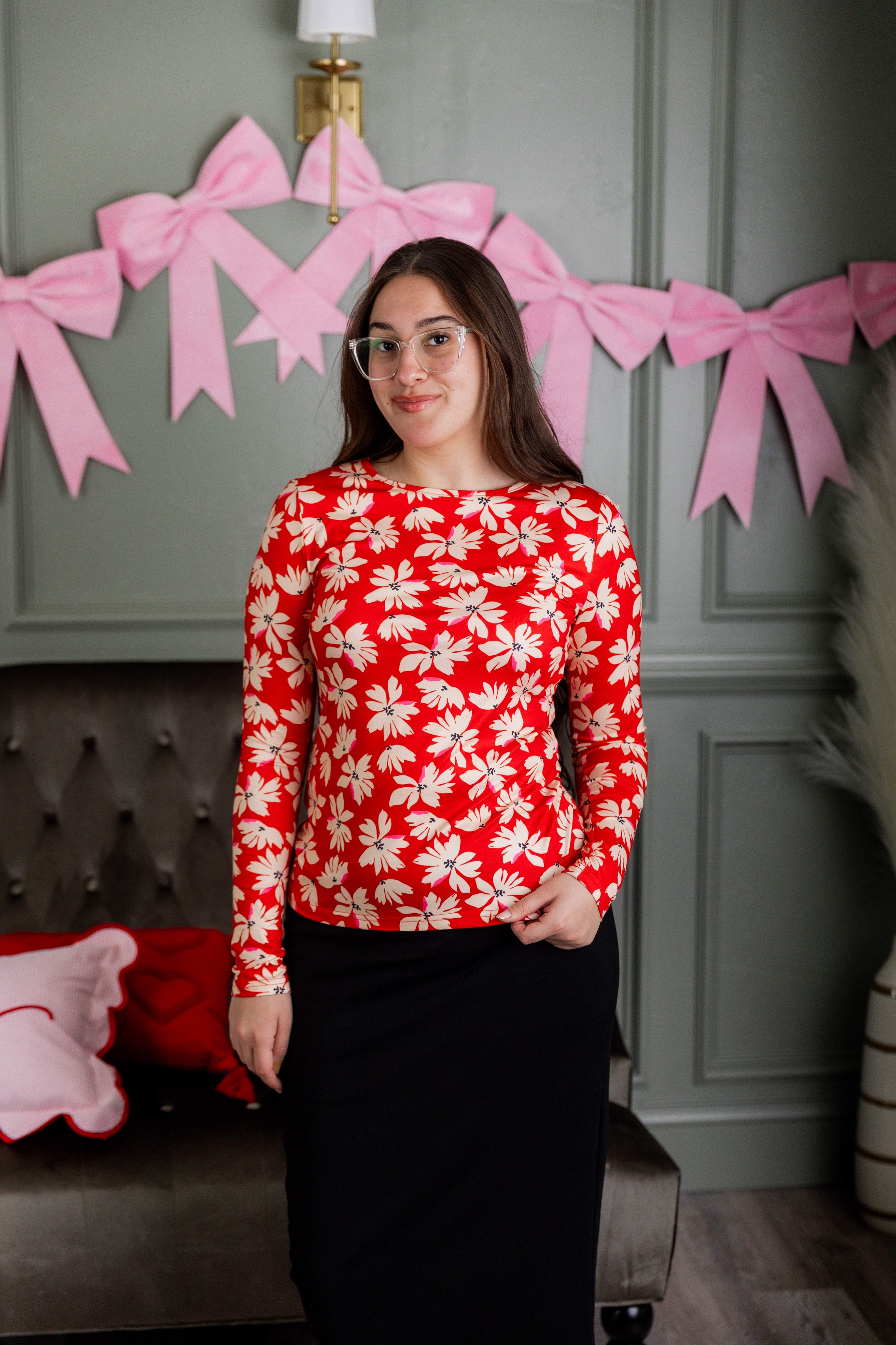 Model wearing Nuggles® Essential Long Sleeve Tee in Red Petal Party