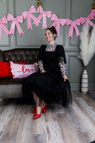 Model wearing Nuggles® Mesh Tee top in Snow Leopard