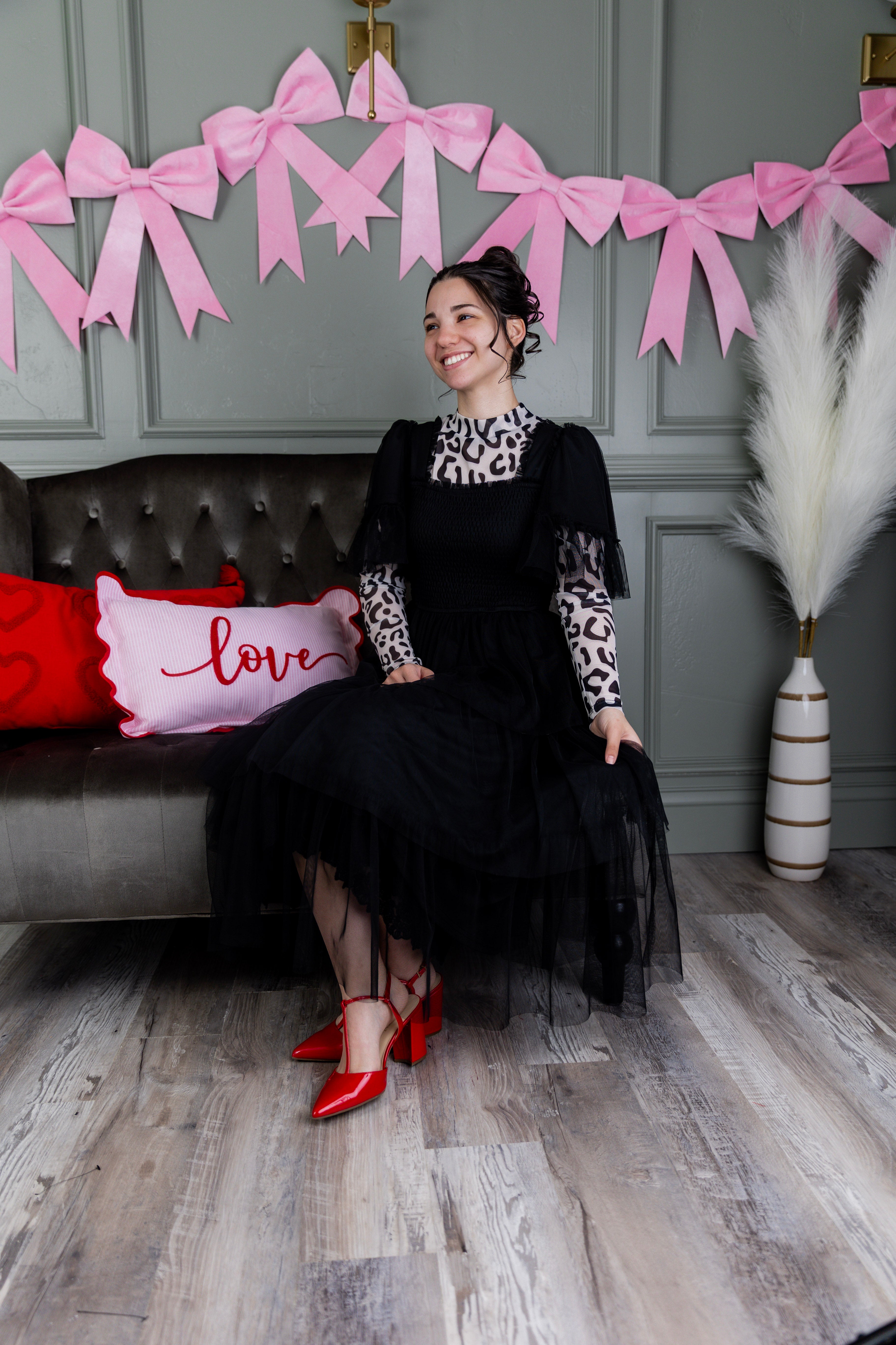 Model wearing Nuggles® Mesh Tee top in Snow Leopard