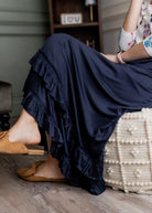 Model wearing Nuggles® Callie Skirt in Navy modest skirt