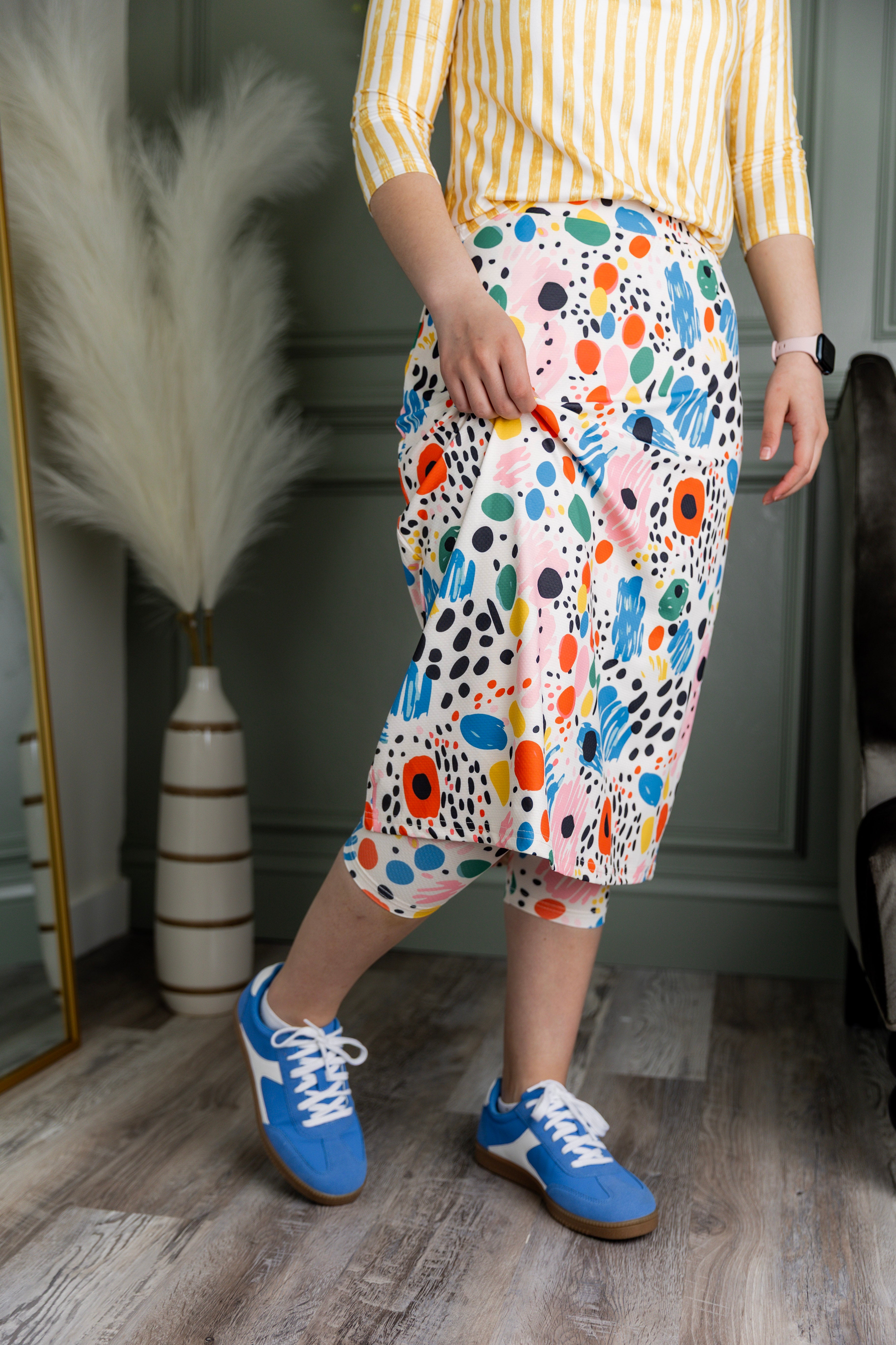 Model wearing Nuggles® 27" Sport Skirt in  Party Sprinkles 