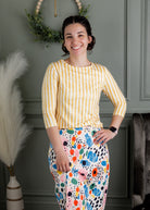 Model wearing Nuggles® 3/4 Essential Tee in Lemon Drop Stripe