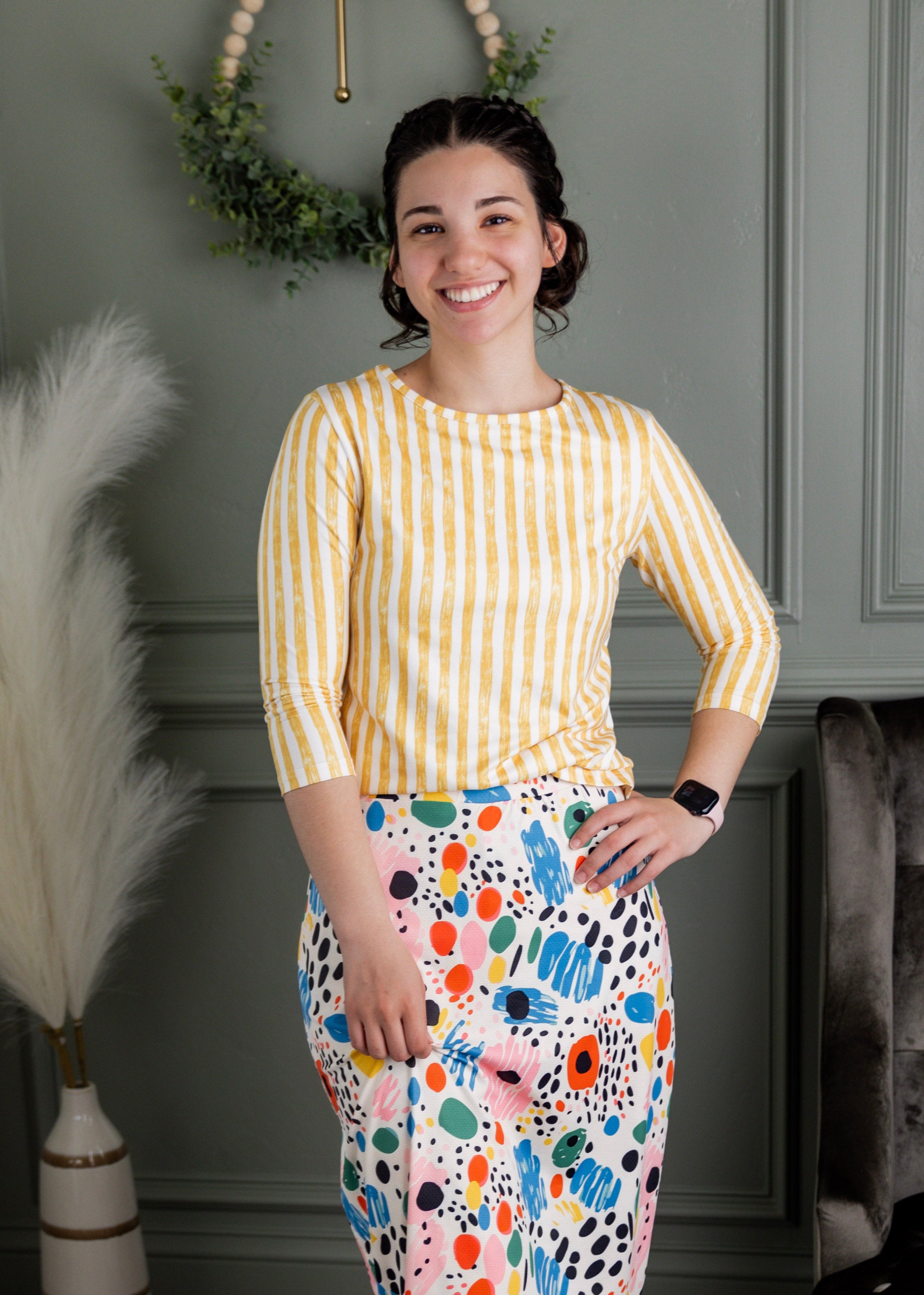 Model wearing Nuggles® 3/4 Essential Tee in Lemon Drop Stripe