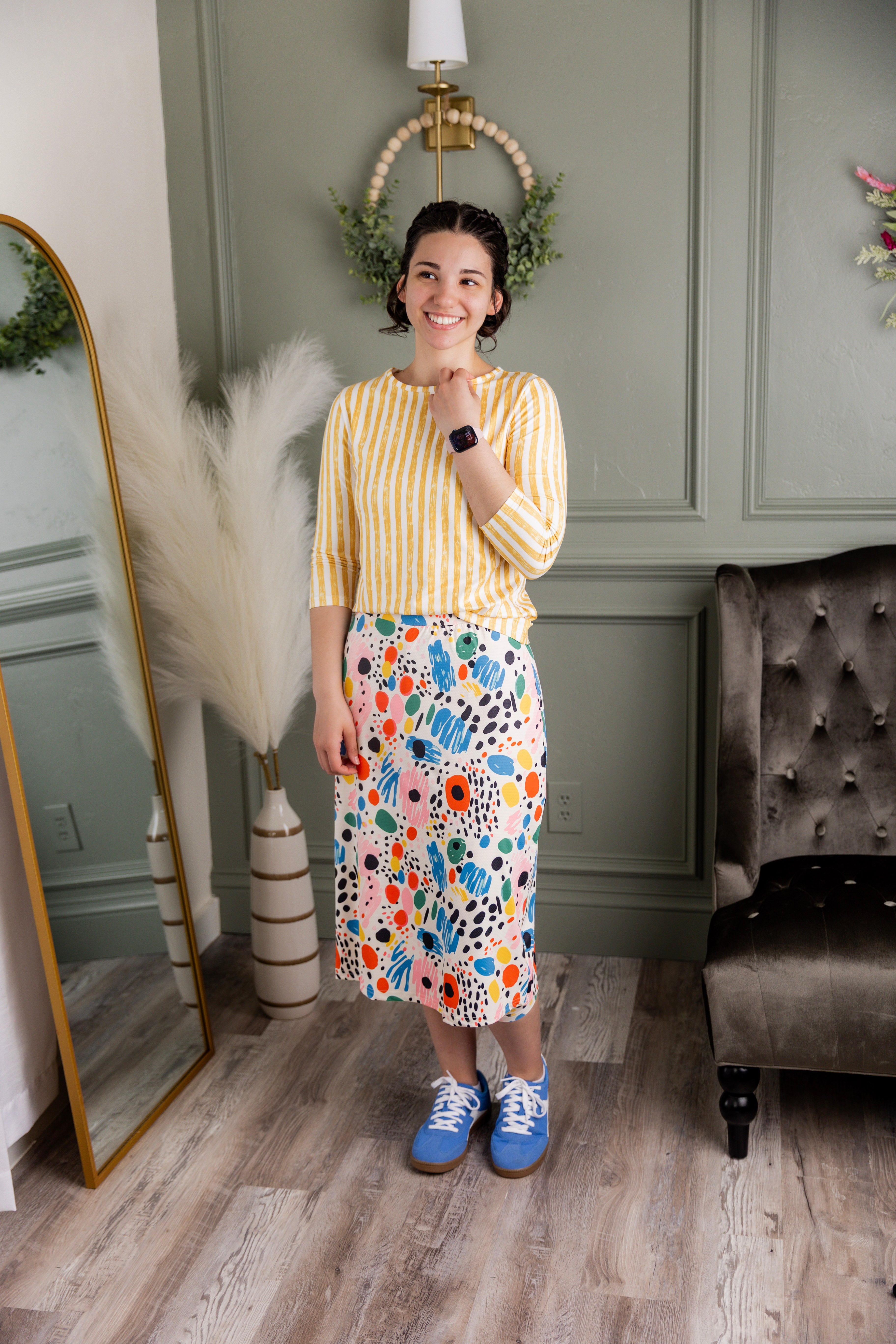 Model wearing Nuggles® 27" Sport Skirt in  Party Sprinkles 