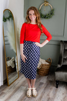 Model wearing Modest Nuggles® 27" Drawstring Skirt in Doggy Doodles 