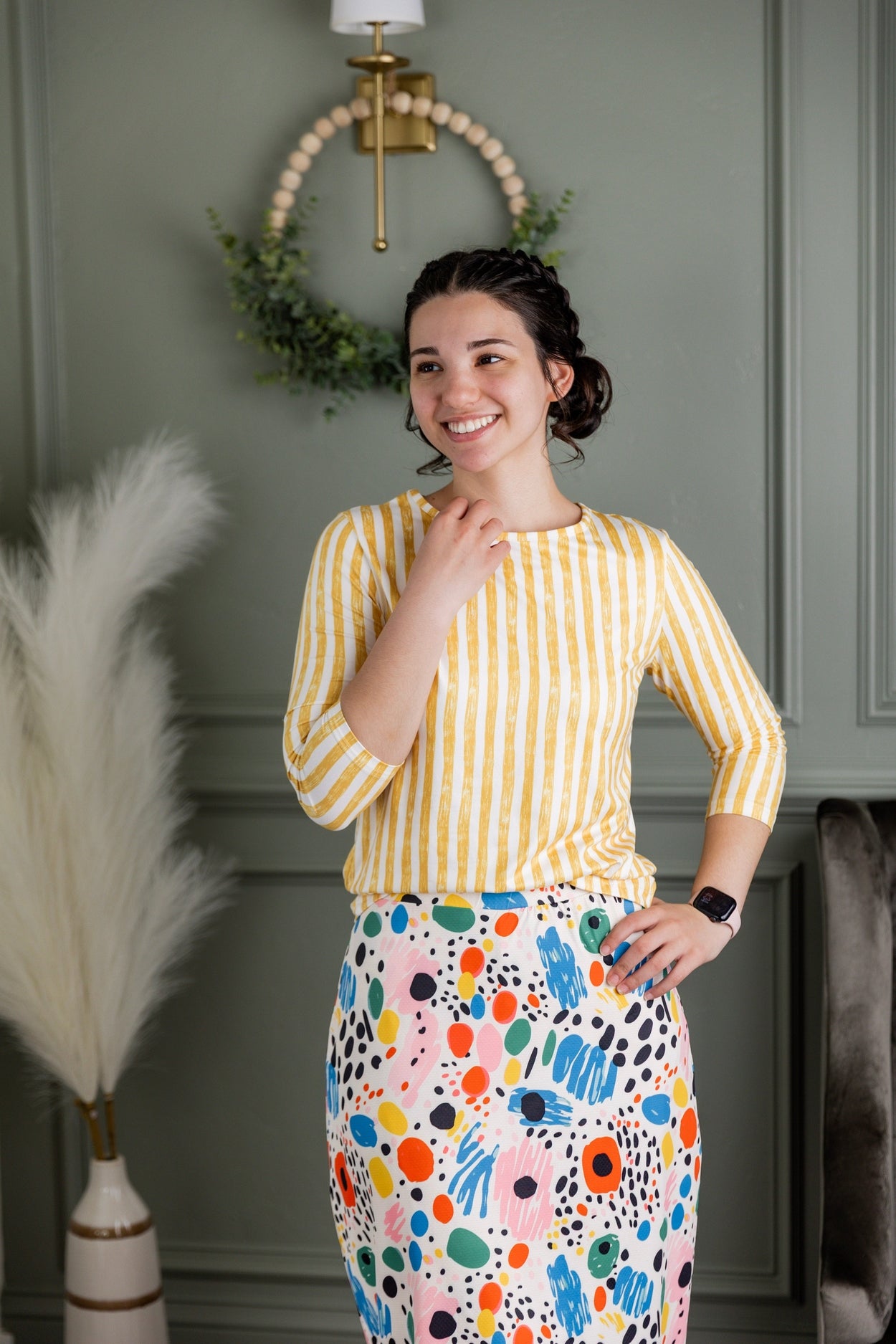 Model wearing Nuggles® 3/4 Essential Tee in Lemon Drop Stripe
