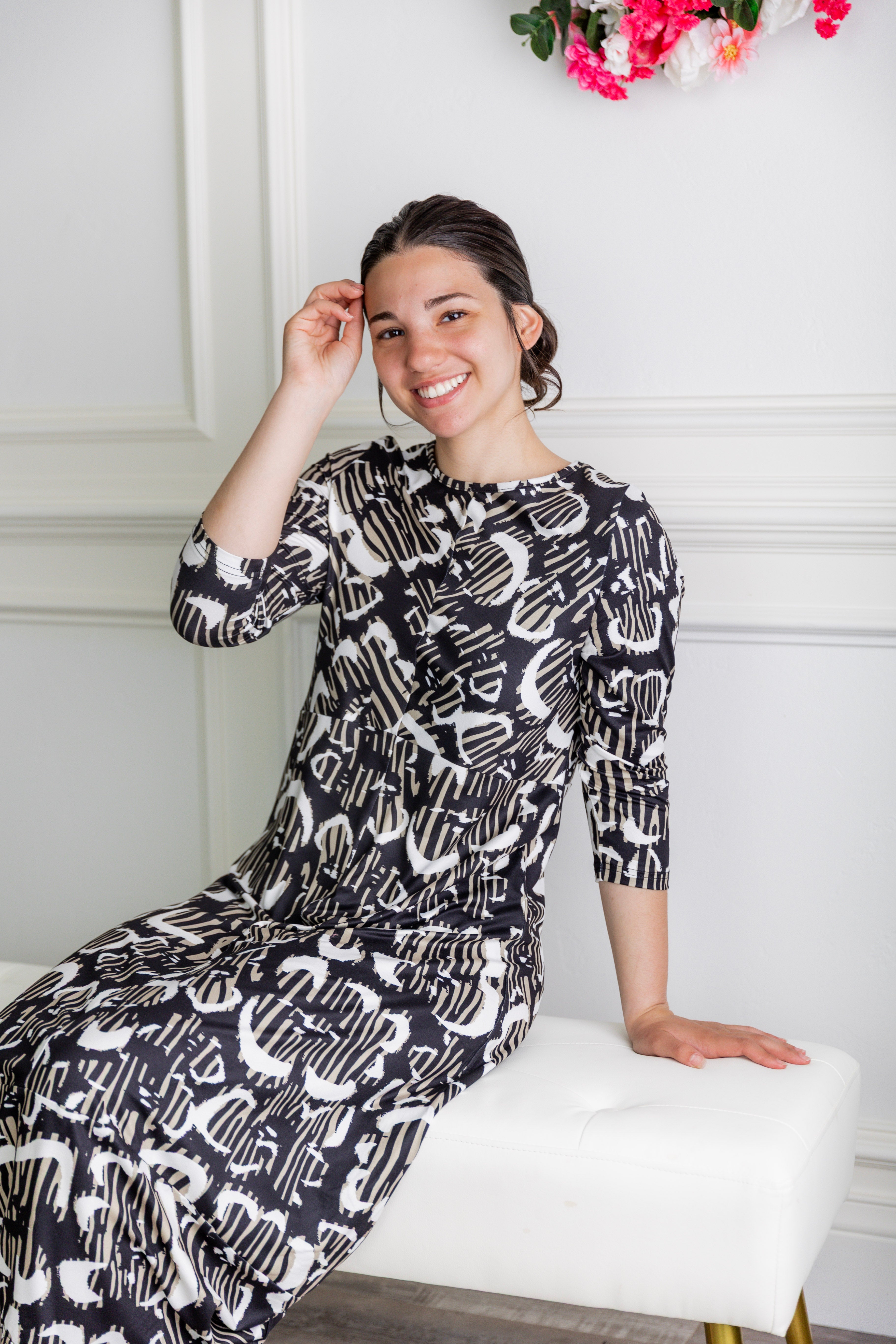 Model wearing Modest Nuggles® Cindy Bubble Dress in Mocha Brushstroke