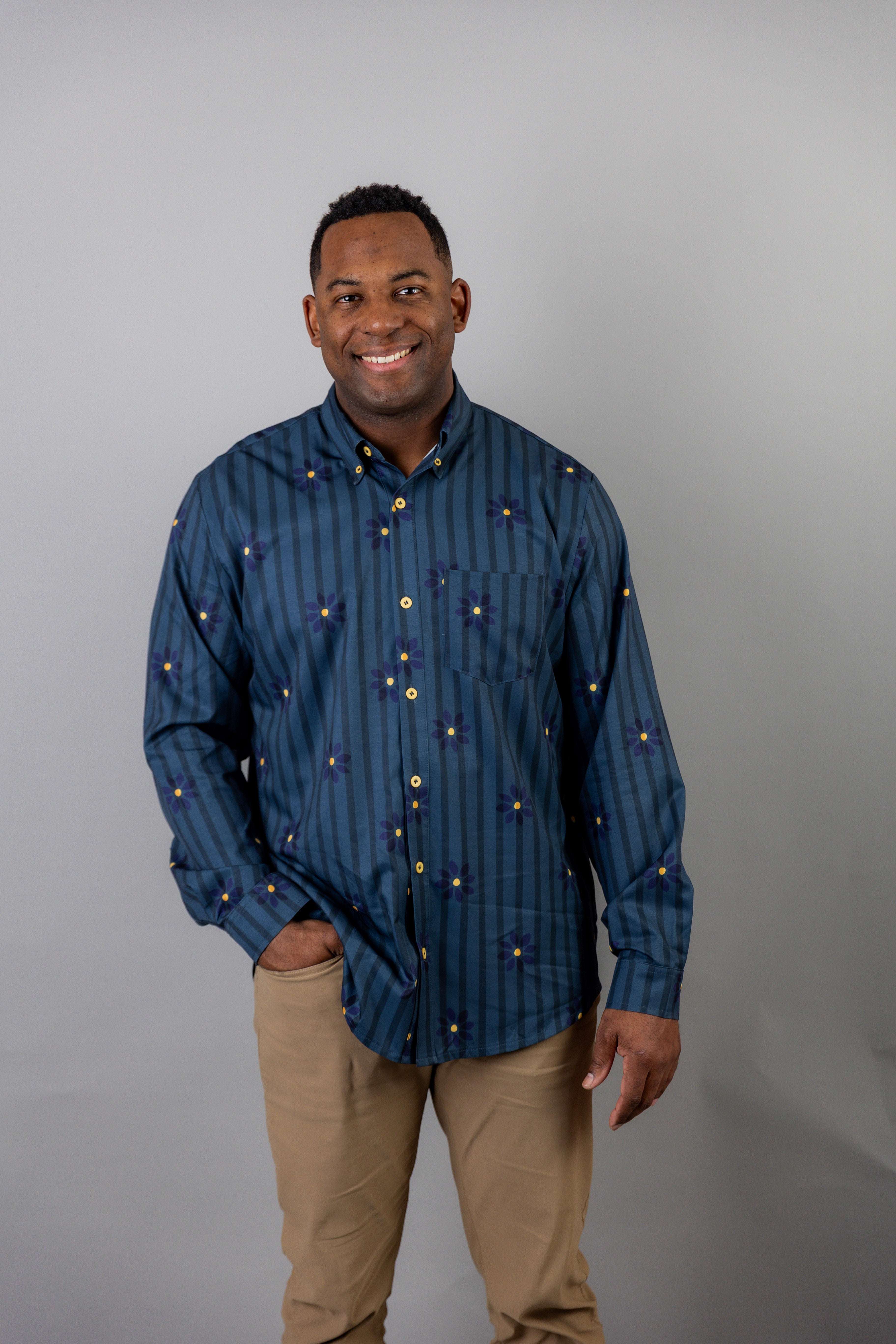 Model wearing Nuggles® Men's Button Down Shirt in Pinstripe Ditsy