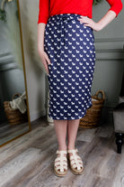 Model wearing Modest Nuggles® 27" Drawstring Skirt in Doggy Doodles 