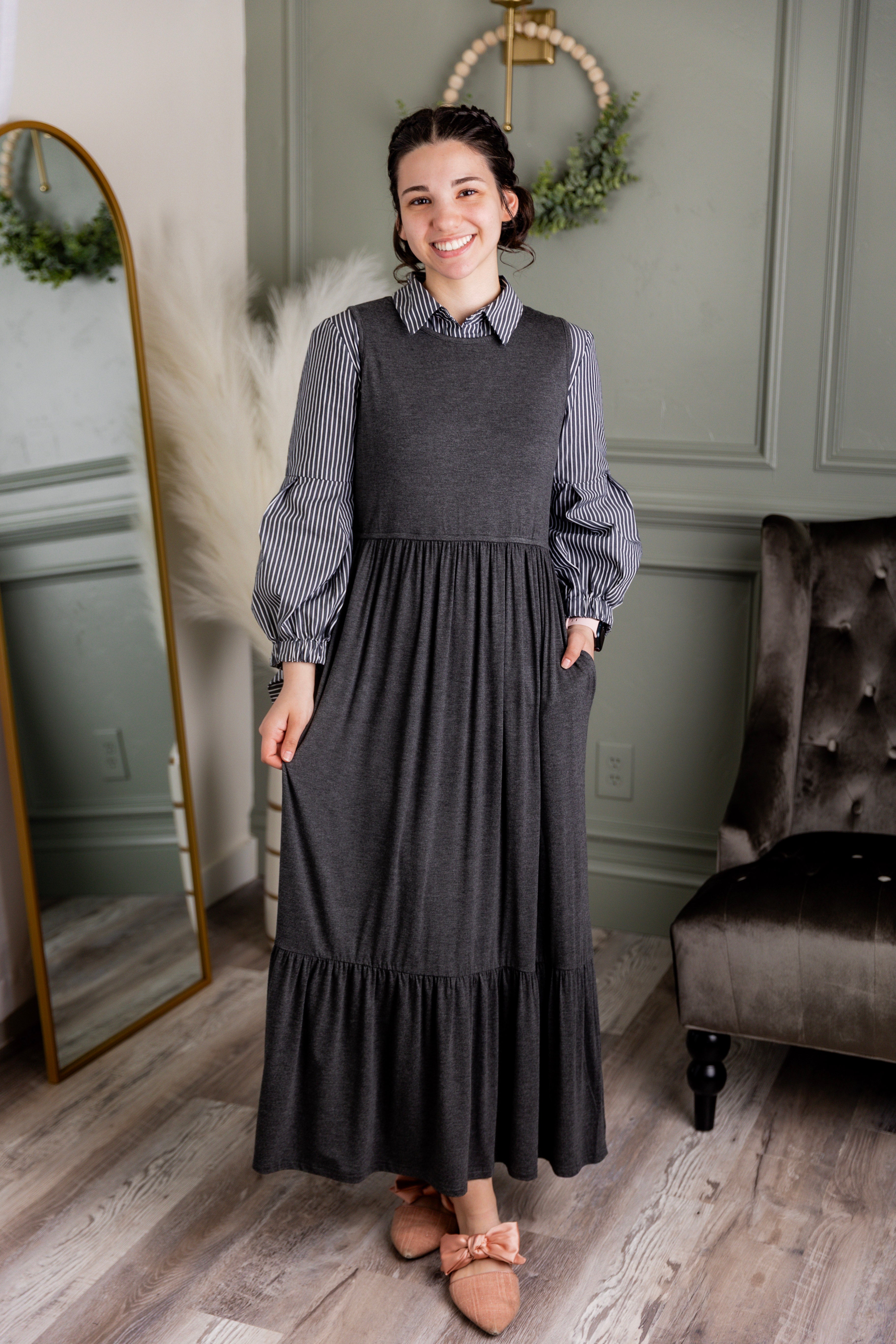 Model wearing the Nuggles® Riley Dress in Heather Gray