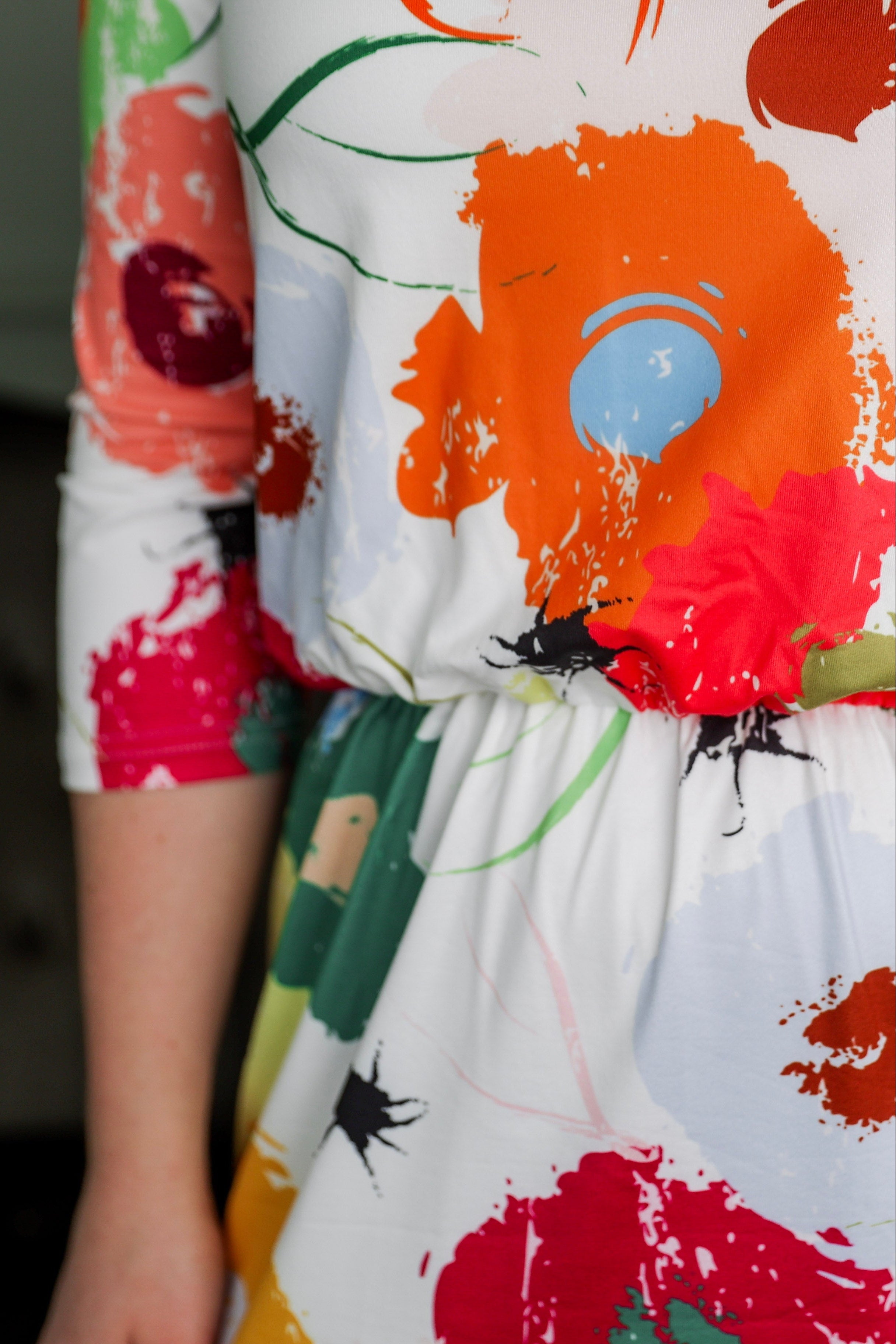 Model wearing Modest Nuggles® Harper Jane Dress in Party Blooms