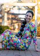 Model wearing the Nuggles® Original Midi Layering Dress in Wildflower Haze