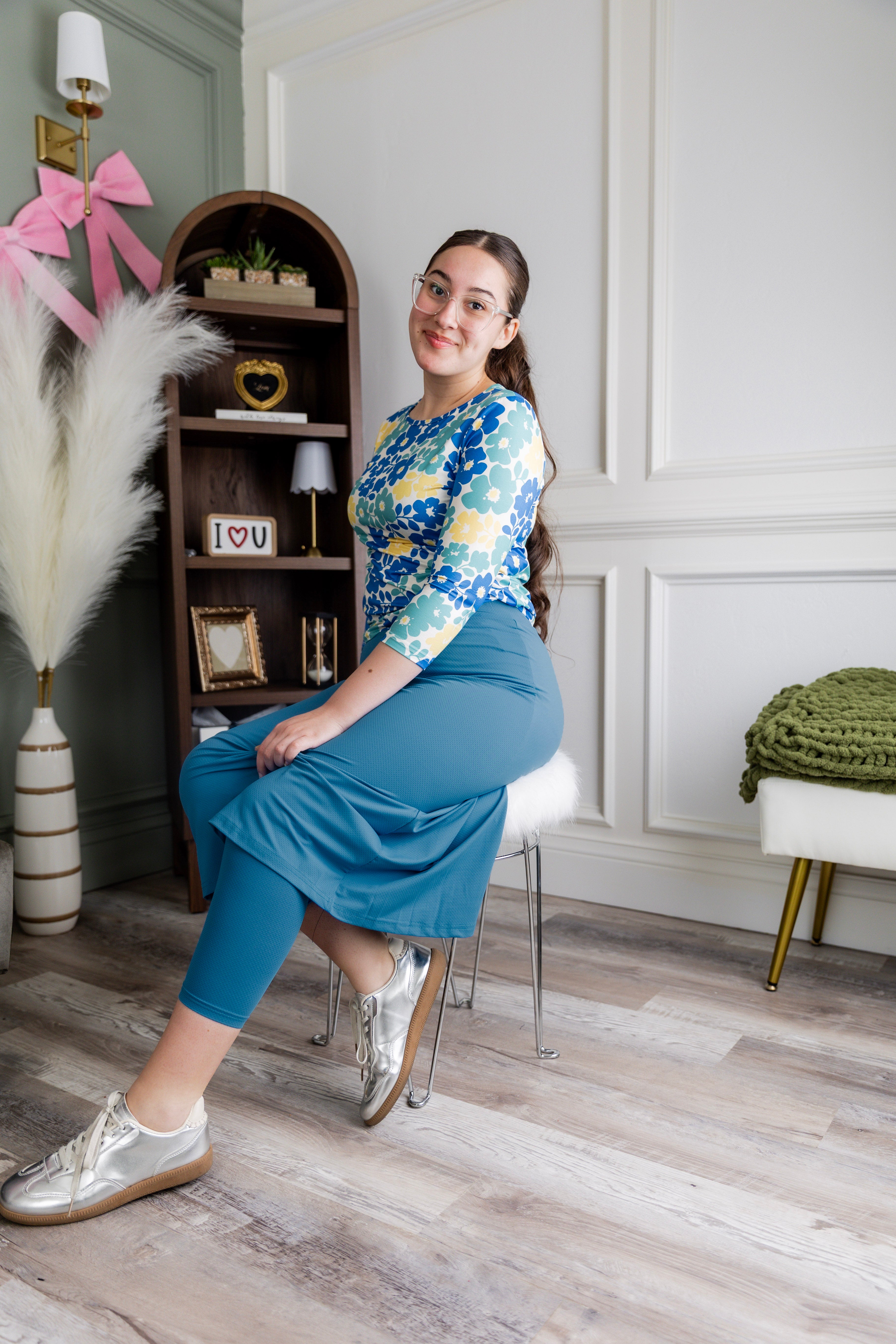 Model wearing Nuggles® 31" All-Sport Skirt in Turquoise