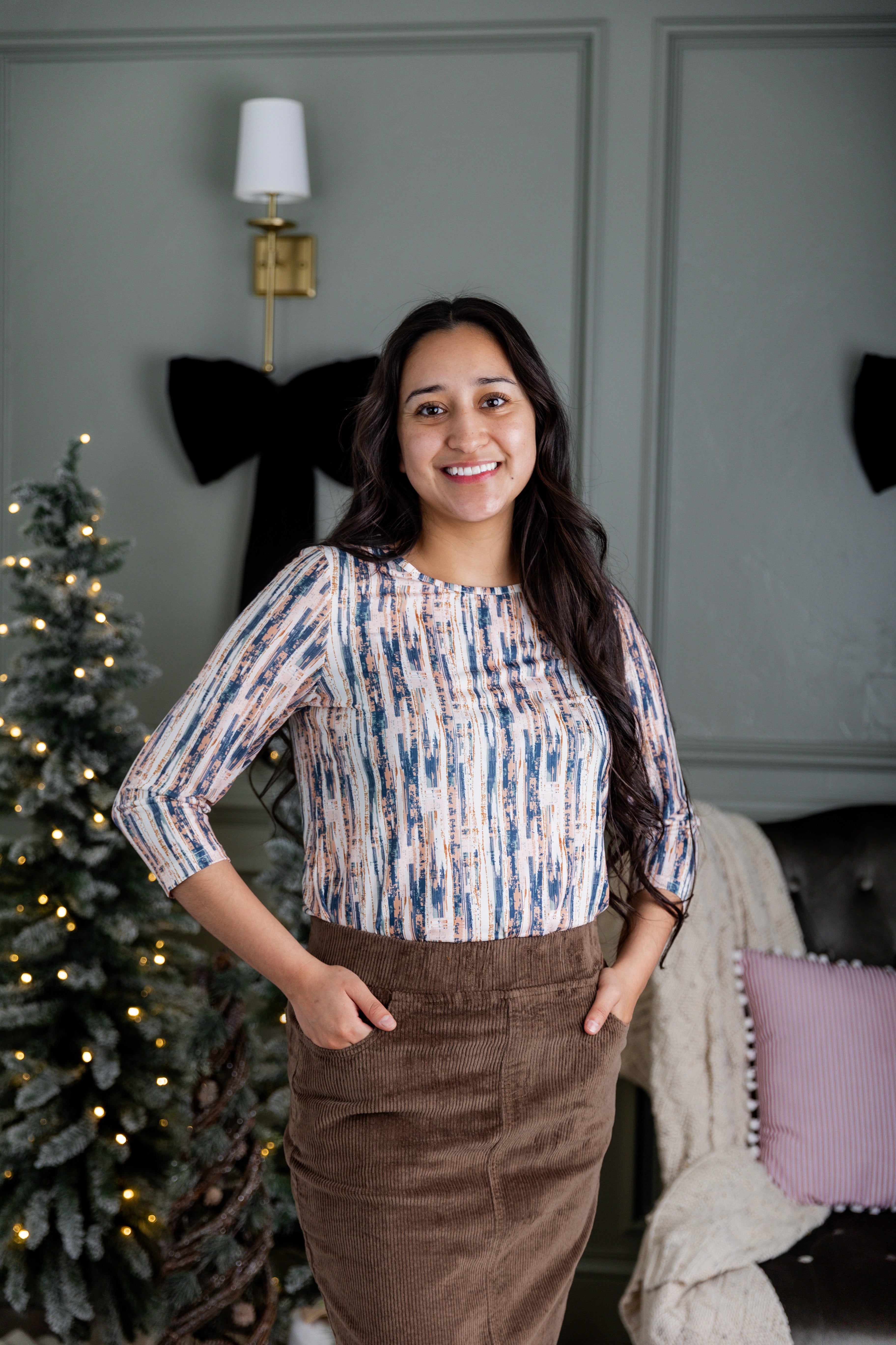 Model wearing Nuggles® 27-inch corduroy skirt