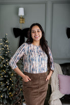 Model wearing Nuggles® 27-inch corduroy skirt