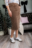 Model wearing Nuggles® 27-inch corduroy skirt