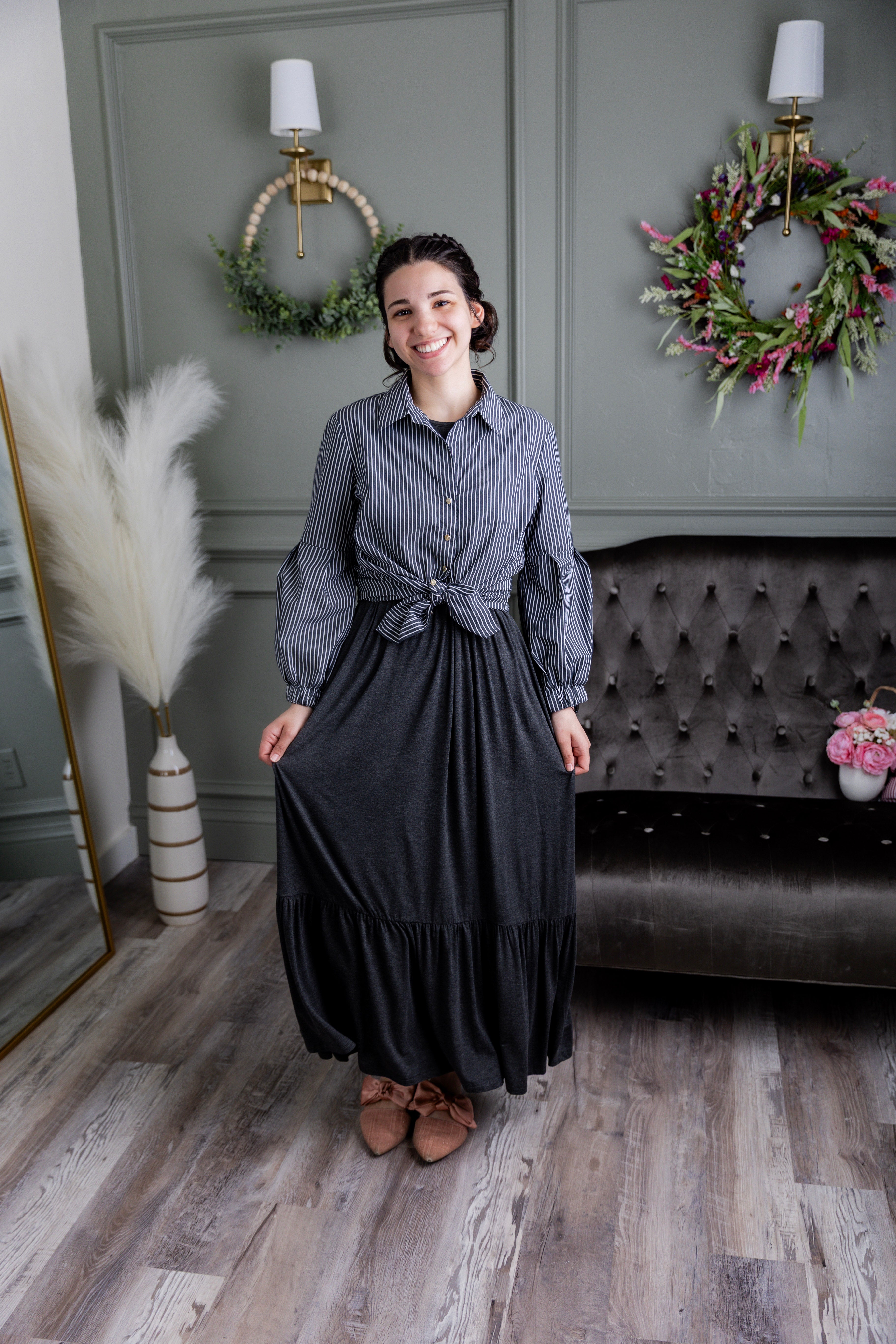 Model wearing the Nuggles® Riley Dress in Heather Gray