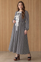 Model wearing Nuggles®  Addison Dress in Cookie Check