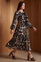 Model wearing Nuggles®  Addison Dress in Midnight Safari
