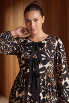 Model wearing Nuggles®  Addison Dress in Midnight Safari