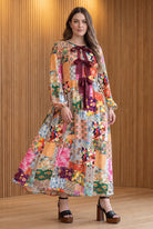 Model wearing Nuggles®  Addison Dress in Carousel
