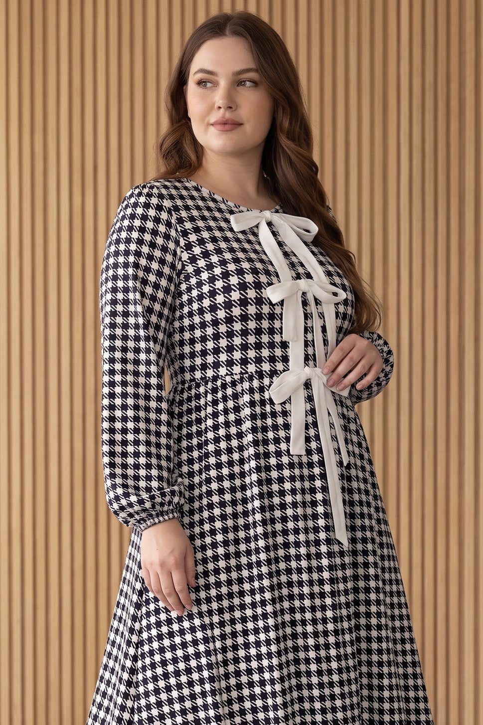 Model wearing Nuggles®  Addison Dress in Cookie Check