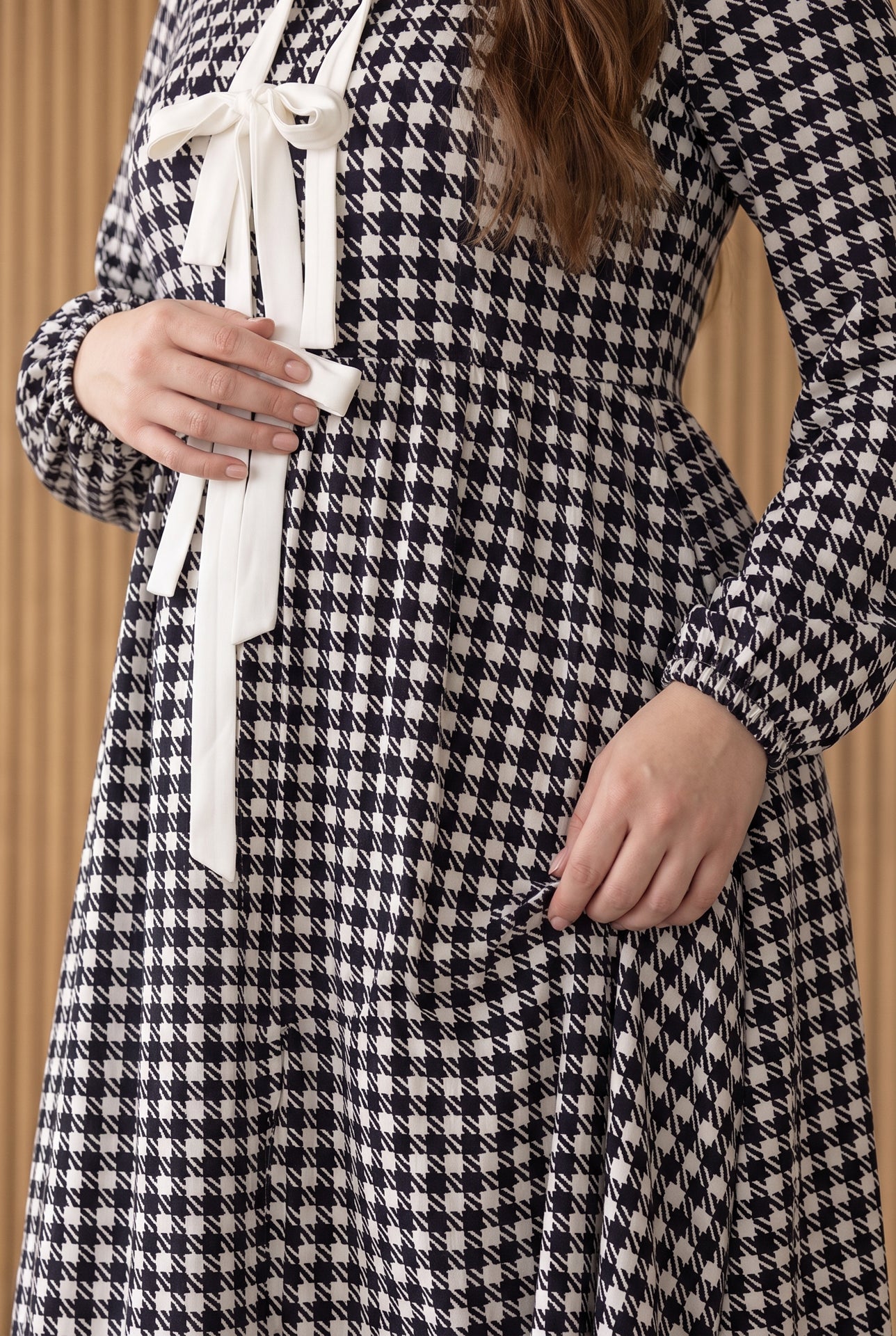 Model wearing Nuggles®  Addison Dress in Cookie Check