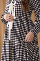 Model wearing Nuggles®  Addison Dress in Cookie Check