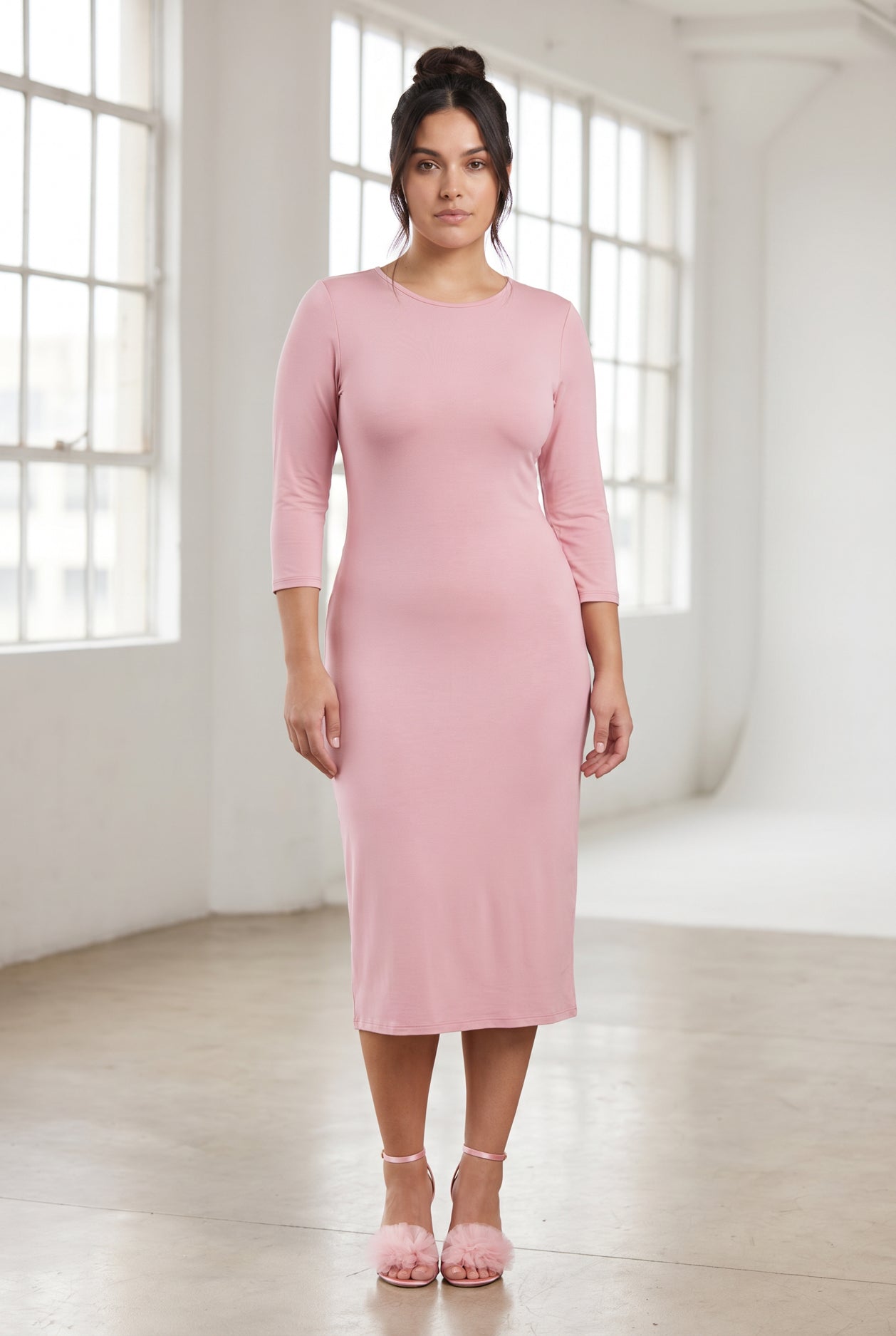 Model wearing Nuggles® Midi Layering Dress in Baby Pink