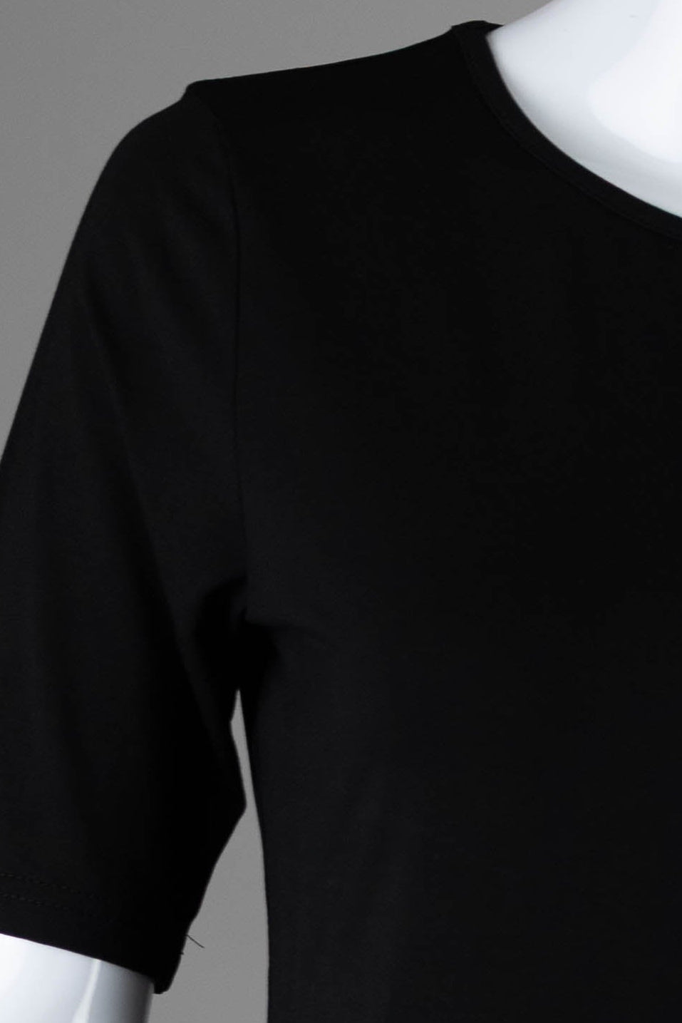 Model wearing Nuggles®  Half Sleeve Essential Tee in Black