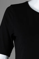 Model wearing Nuggles®  Half Sleeve Essential Tee in Black