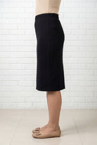 Model wearing Nuggles® 25" Relaxed Midi Skirt in Black