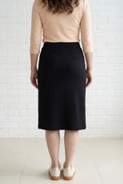 Model wearing Nuggles® 27" Relaxed Midi Skirt in Black