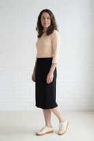 Model wearing Nuggles® 27" Relaxed Midi Skirt in Black
