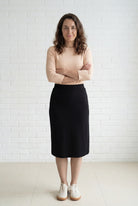 Model wearing Nuggles® 27" Relaxed Midi Skirt in Black