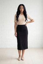 Model wearing Nuggles® 31" Relaxed Midi Skirt in Black