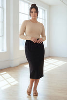Model wearing Nuggles® 31" Classic Skirt in Black