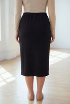 Model wearing Nuggles® 31" Classic Skirt in Black